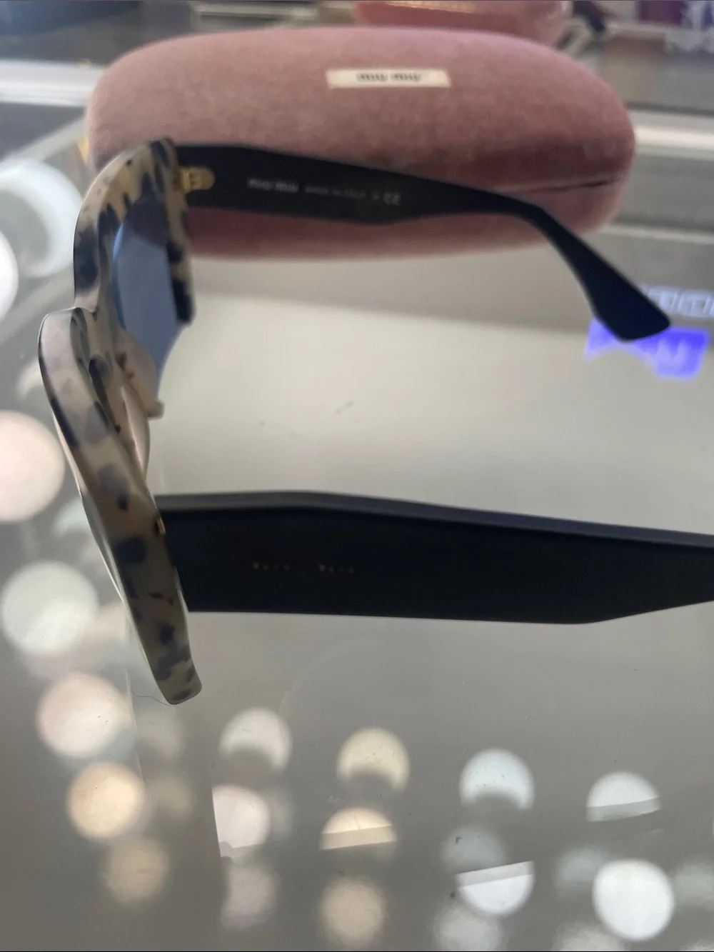 Miu Miu Tortoiseshell Cat-Eye Sunglasses with Dark Blue Lenses
